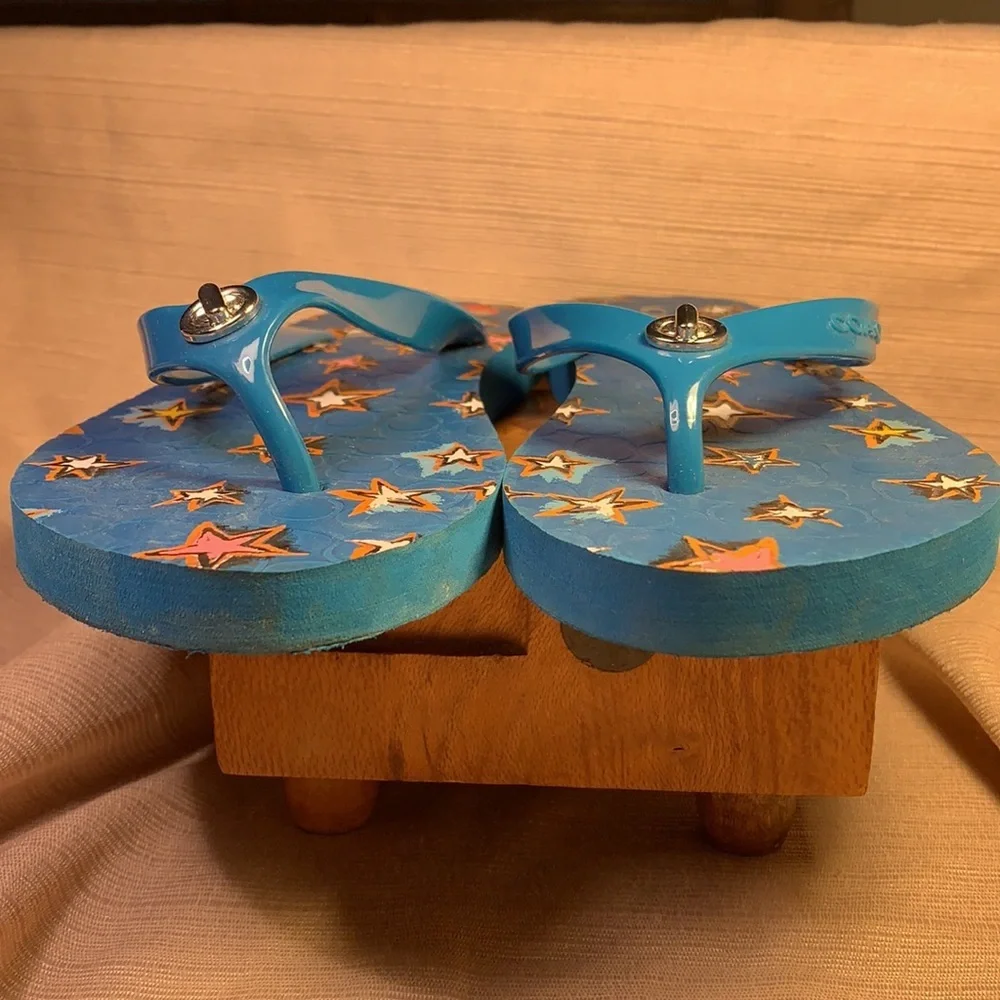 Coach star flip-flops worn once (partial tags)